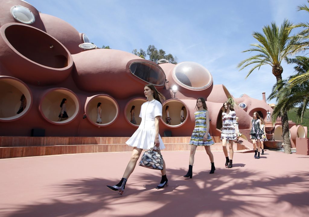Models present creations by Belgian fashion designer Raf Simons during the Dior 2016 cruise collection show, on May 11, 2015 at the Palais Bulle in Theoule-sur-Mer, southeastern France.  AFP PHOTO / VALERY HACHE        (Photo credit should read VALERY HACHE/AFP/Getty Images)